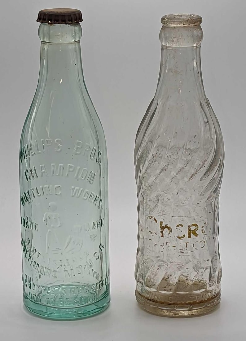 Vintage Phillips Bros Bottling & Chero Cola Bottles: Vintage Phillips Bros Bottling & Chero Cola Bottles. This lot includes: (1) Phillips Bros Champion Bottling Works Bottle Green Glass 8 Fl Oz Baltimore MD. This is approx 2 1/2" x 2 1/2" x