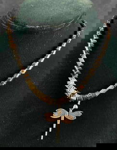 Natural Bead Necklace w Sterling Charms & Clasp: Natural Bead Necklace w Sterling Charms & Clasp Pictured is a handmade necklace by jewelry designer Christina Dickson. Dickson only used quality materials such as real stones and sterling
