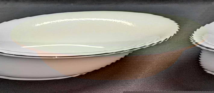 Wedgwood China Silver Ermine 10" Oval Vegetable Bowl: Wedgwood China Silver Ermine 10" Oval Vegetable Bowl. This series was released from 1971 - 1993. The bowl is approx 10" x 8" x 2" and it weighs 1.26lb The bowl is in a good, used condition with no chi