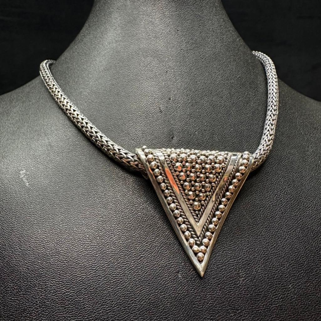 Indonesian Sterling Triangle Pendant Necklace: This piece of jewelry has been tested and researched prior to listing. Please view all our pictures they are part of our description. DETAILS: Metal - Sterling Silver Color - Silver Stones - none Hall