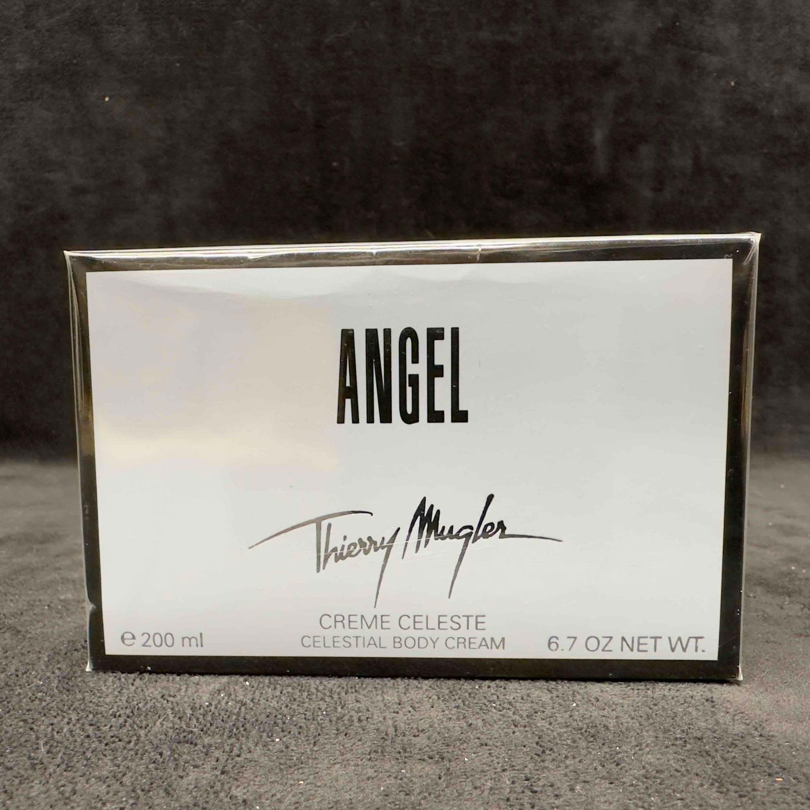 Angel By Thierry Mugler Creme Celeste Celestial Body Cream 200ml. 6.7 Fl. Oz Sealed New: Angel By Thierry Mugler Creme Celeste Celestial Body Cream 200ml. 6.7 Fl. Oz Sealed New. Brand New Sealed. This item is in good like new, previously displayed condition with light wear, and surface sc