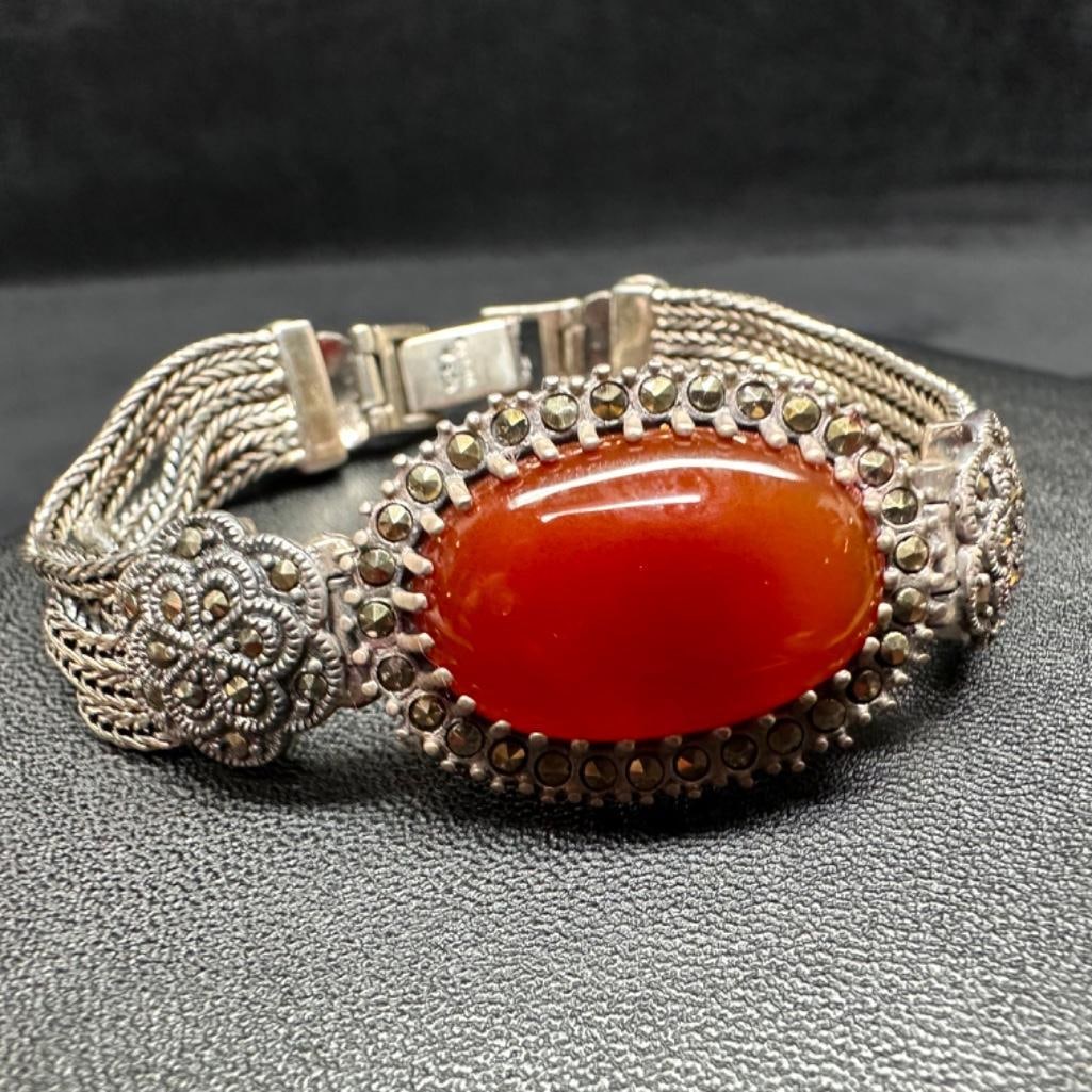 Sterling Carnelian Bracelet: This piece of jewelry has been tested and researched prior to listing. Please view all our pictures they are part of our description. DETAILS: Metal - Sterling Silver Color - Silver Stones - carnelian