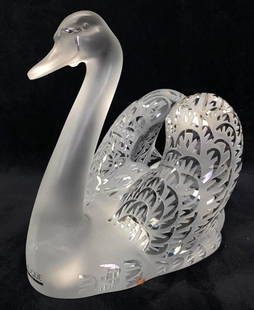 Lalique Swan Head Up Sculpture: Lalique Swan Head Up Sculpture  Large French crystal swan sculpture by Lalique with etched designs in the glass and the classic frosted texture contrasting with the smooth areas. The piece is signed o