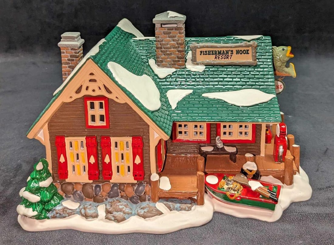 Retired Snow Village Fisherman's Nook Resort: Retired Snow Village Fisherman's Nook Resort. Was released from the year 1994 to the year 1999. Comes in its original box that is approx 12 7/8" x 9 3/4" x 8" and it weighs 4.57lbs. The Resort is made
