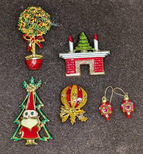 5 Christmas Themed Brooch Pins And Earring Set: 5 Christmas Themed Brooch Pins And Earring Set. This lot includes:  (1) Set Small Gold Tone Ornament Earrings For Pierced Ears. Each is approx 3/8&#34; x 1/8&#34; x 1 1/4&#34;. (1) Silver Tone Christm