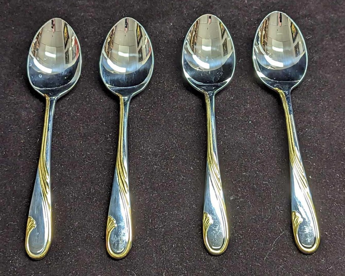 4 Retired Gorham Golden Swirl Oval Soup Spoons B: 4 Retired Gorham Golden Swirl Oval Soup Spoons B. This series was released by Gorham Silver from the year 1982 to the year 2001. These stainless steel spoons have signs of light wear with markings and