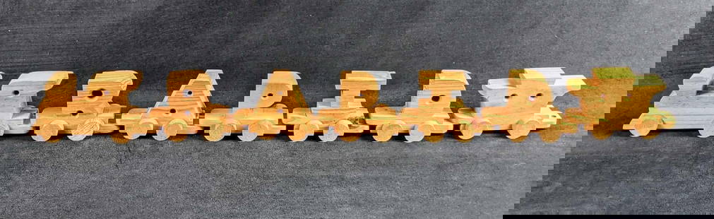 Vintage Hand Carved Wood Alphabet Train: Vintage Hand Carved Wood Alphabet Train. Comes with nearly all of the letters with the exception of J, M, and V. Wood is nice and heavy. The maker and date of creation are unknown. Comes with an engin