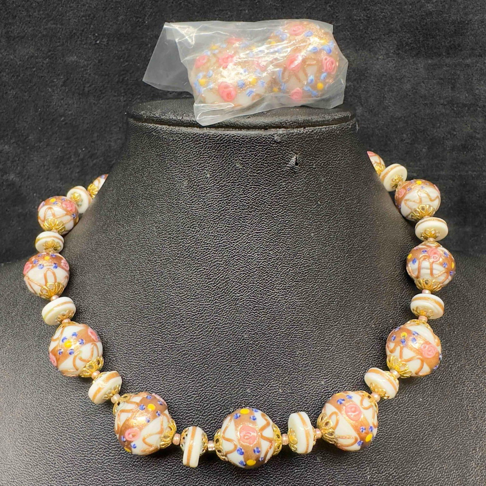 Venetian Murano Art Glass Lamp Work White Floral Necklace and Fiorato Earrings Set E10: Venetian Murano Art Glass Lamp Work White Floral Necklace and Fiorato Earrings Set E10. Necklace and earrings with white colored glass beads with beautiful hand painted designs on each. The necklace a