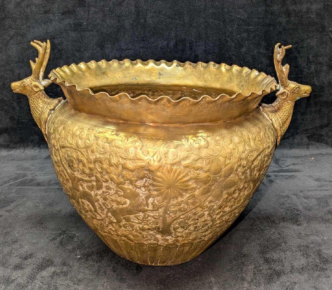Vintage Brass Stag Indian Engraved Planter: Vintage Brass Stag Indian Engraved Planter. This is approx 13 1/2" x 10" x 9 1/4" and it weighs 1.50lb.The planter has tarnish and dents on the bottom. Please see the images as they are part of the de