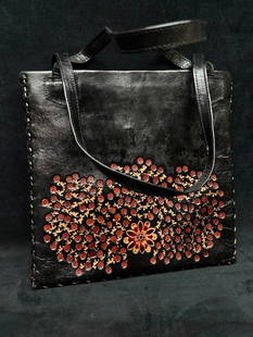 Vintage Leather Handicraft Purse Embossed Flowers C: Vintage Leather Handicraft Purse Embossed Flowers  Leather handicraft purse, with embossed flower pattern on the sides of the bag. The bag is hand-stitched and has a very soft leather liner and inside