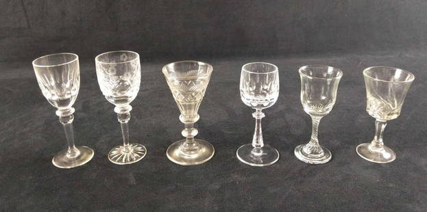 6 Assorted Crystal Glass Sippers Port Sherry Glassses A: This lot includes six different sippers, sherry glasses port glasses, and other small wine glasses. Some are crystal and some are glass. Most are not marked, except for one Gorham Crystal glass. Glass