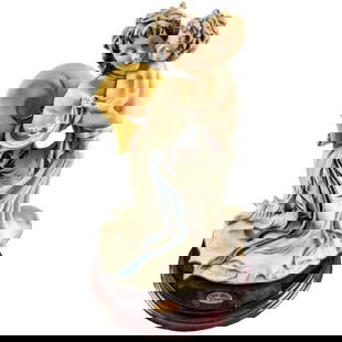 Giuseppe Armani Baby Mine Statue: Giuseppe Armani Baby Mine Statue  Open Edition Baby Mine&#34; Giuseppe Armani Statue. The figurine is made of Capodimonte porcelain and is approx 6&#34; x 6&#34; x 9 1/2&#34; and it weighs 2.03lbs. Th