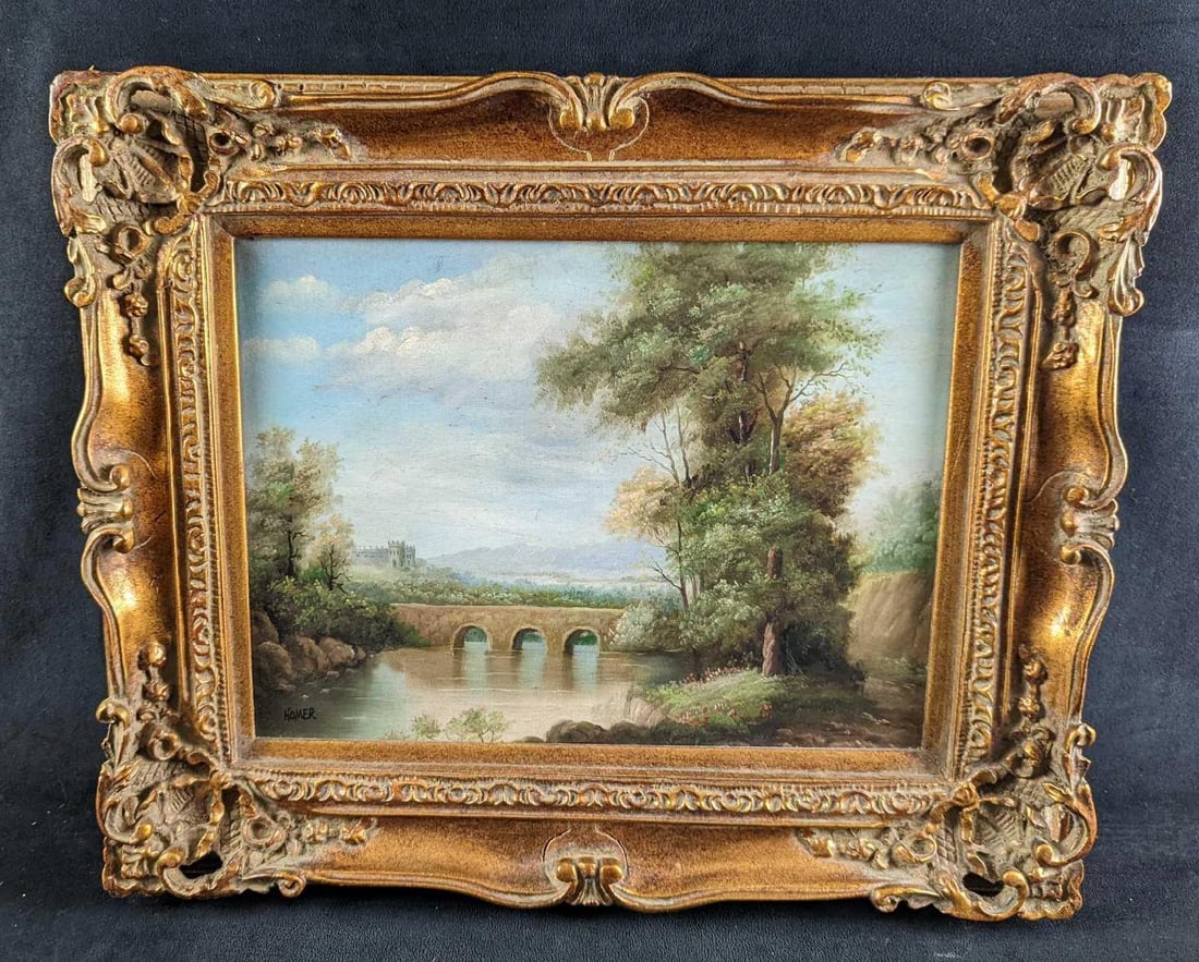 F5 Framed Oil On Canvas Bridge & Castle Scenery: Framed oil on canvas of an scenery that includes trees, a bridge, a lake and a castle in the background. The framed original is signed by the artist near the bottom left (Homer). The framed original i