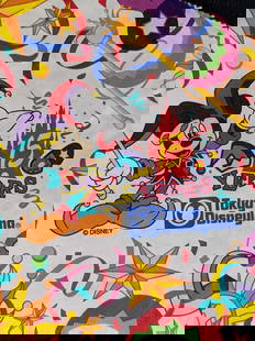 15th Anniversary Tokyo Disneyland Paper Bag: 15th Anniversary Tokyo Disneyland Paper Bag. The folded bag is approx 11" x 9" and has never been opened or used. The bag is under one pound at 0.08lb.