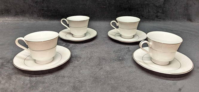 4 Retired International Juliet Saucers & Tea Cups C: 4 Retired International Juliet Saucers &amp; Tea Cups C. This lot of fine china contains:  (4) Saucers. Each is approx 6&#34; x 6&#34; x 3/4&#34;. The design has some discoloration. (4) Tea Cups. Each