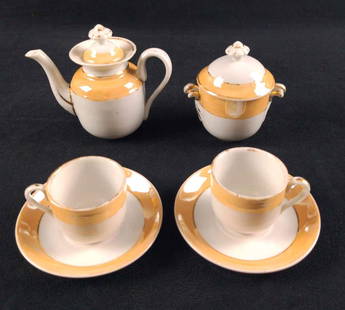 Vintage Lusterware Minature Porcelain Tea Set: This lot includes:  (6) Saucers. These are approx 4&#34; x 4&#34;. (4) Demitasse Tea Cups. These are approx 2 1/2&#34; x 2&#34; x 2&#34;. (1) Tea Pot. This is approx 5&#34; x 2&#34; x 4&#34;. (1) Suga