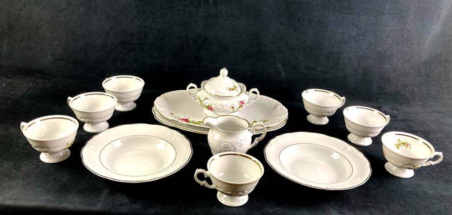 Large Royal Kent Dining Set: Up for auction is a recent estate find, a Royal Kent dining set with a multitude of cups, platters, and tea pots. The items in this lot are ornately designed with flowers and plants. This auction incl