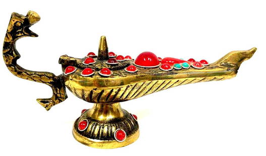 Vintage Brass Aladdin Genie Lamp: This lot contains a Vintage Brass Aladdin Genie Lamp. It is approx 5 3/4" x 2" x 3 3/4" and it weighs about 0.4lbs. Overall the Genie Lamp is in good used condition with some light wear from use over