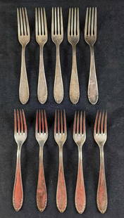 10 Retired Vintage BMF Silverplate Forks: Lot of 10 silver-plated forks by Bergische Metallwaren Fabrik in Germany. The spoons are marked BMF90 on the back. In good condition with some tarnish and scratches from wear. Each fork is approx 8" a