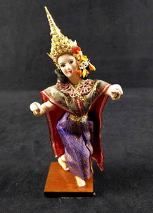Vintage The Princess Bangkok Cloth Doll: "THE PRINCESS" BANGKOK DOLL #101 Beautiful cloth doll 11.5" with a painted fabric face and elaborate jeweled costume. She stands firmly on a wooden base. Doll and base are approx 2 1/2" x 2" x 8 1/2".