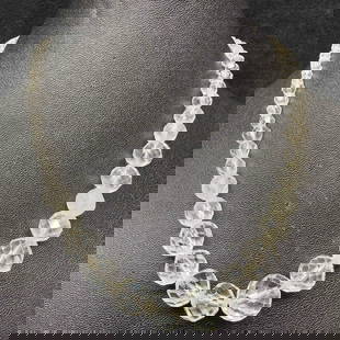 Clear Crystal Art Glass Round Bead Costume Jewelry Beaded Necklace G94: Clear Crystal Art Glass Round Bead Costume Jewelry Beaded Necklace G94. Necklace clear glass beads with beautifully shaped designs on each. The necklace features a spring ring clasp closure. Light