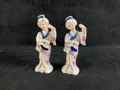 Two Japanese Geisha Porcelain Figurines: Two Japanese porcelain figurines from a recent estate. Beautifully painted and displayed. This auction includes:   (2) Japanese Geisha Porcelain Figurines    Condition is cons