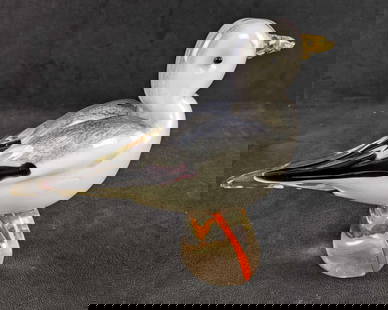 Glass Seagull Statue Glass Art: Glass Seagull Statue Glass Art This Seagull is made from colored glass melded into a bird shape. This seagull glass statue has a chipped beak but is overall in good condition.  7in tall 9in long Weigh
