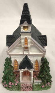 First Evangelical Church Statue By International Resources LLC: This lot contains a statue of the First Evangelical Church an exclusive creation done by the International Resources LLC. Hand crafted in China in 2001. The statue is approx 3" x 2 1/2" x 4" and weigh