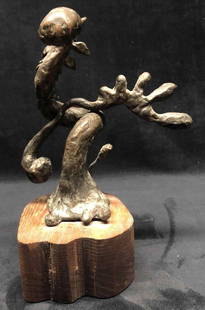 Bronze Abstract Sculpture By Diane Dull: This lot contains a bronze abstract sculpture made by Diane Dull. The sculpture sits on a thick wood base and has a felt patch on the bottom to avoid damaging surfaces. The sculpture comes in two part