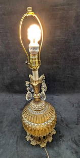 Vintage Elegant Round Cut Glass Table Lamp B: Vintage Elegant Round Cut Glass Table Lamp A. This is approx 8" x 8" x 25 1/2" (20" without the harp) and it weighs 5.40lbs. Was tested and the top light works. The bottom light turns on and off quick
