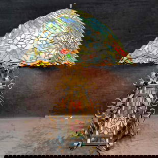 Tiffany Style Stain Glass Lamp Stained Glass Art Floral Flower Lampshade: Tiffany Style Stain Glass Lamp Stained Glass Art Floral Flower Lampshade. The base of this lamp is made of metal. The lamp shade features a floral multicolored design. No noticeable chips, cracks, or