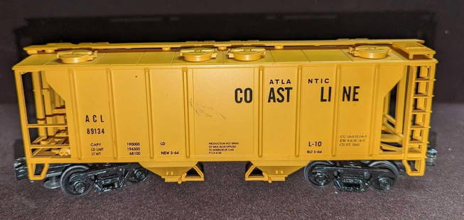 M.T.H. O Scale Atlantic Coast Line PS-2 Hopper Car: M.T.H. O Scale Atlantic Coast Line PS-2 Hopper Car. This is approx 10" x 2 3/4" x 3 1/8". It comes in its original box that is approx 12 1/2" x 3 3/4" x 5 1/2" and it weighs 1.03lb The box has some sh