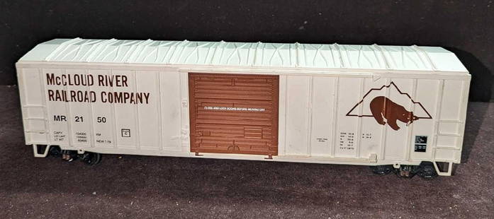 O Scale McCloud River Railroad Company MR 2150: O Scale McCloud River Railroad Company MR 2150. Is marked Kadee on the bottom. Is approx 13 3/4" x 2 3/4" x 3 3/4" and it weighs 0.86lb. The top of the boxcar has some small markings and some visible