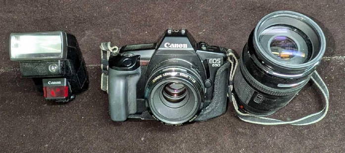 Canon EOS 650 Film Camera with 70-210mm Lens: Canon EOS 650 Film Camera with 70-210mm Lens. Comes with all seen in the images including a Sun Valley camera case. Untested. It comes in a camera bag that is approx 14" x9" x 7" and it weighs 6.10 lb