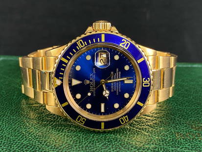 Classic 1987 Ref.# 16808 18K Gold Rolex Submariner: Rolex Classic 1987 Model 16808 18K Gold Rolex Submariner  Model: Rolex Submariner Reference Number: 16808 Size : 40 mm Year: 1987 Serial Number: 9582575 Gender: Unisex Movement: