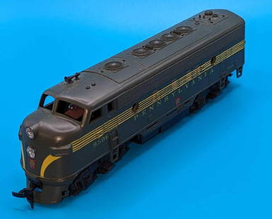AHM TEMPO Pennsylvania 9506 Diesel Engine HO Scale: AHM TEMPO Pennsylvania 9506 Diesel Engine HO Scale. This is approx&nbsp;7 1/2" x 1 1/2" x 2 1/4" and it weighs 1.03lb. Is missing one of the top horns. Untested.&nbsp;