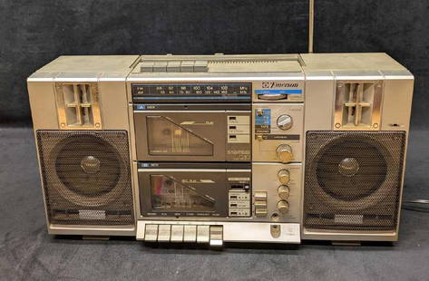 80s Emerson CTR 949 Boombox Dual Cassette Tape Player Radio: 80s Emerson CTR 949 Boombox Dual Cassette Tape Player Radio. This is approx 10 3/8" x 19 1/4" x 6" and it weighs 9lbs. The player was tested and it powers on and the radio works. Was not able to get t