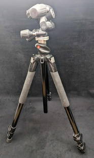 Manfrotto 055XPROB Black Aluminum Tripod & Pan Tilt Head: Manfrotto 055XPROB Black Aluminum Tripod & Pan Tilt Head. Along with the tripod, attached is an&nbsp;Manfrotto 804RC2 Basic Pan Tilt Head with Quick Release. Made in Italy. Is approx 7" x 6 1/2" x 31"
