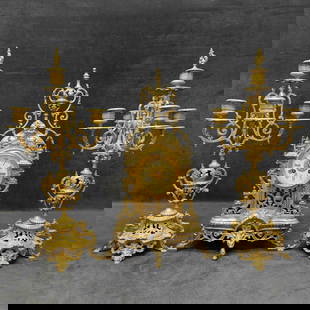 Tiffany and Company Brass Roman Numerals French Baroque Style Mantle Clock Five Light Candelabra Set: Tiffany and Company Brass Roman Numerals French Baroque Style Mantle Clock Five Light Candelabra Set. Marked on the inside backside of the clock Tiffany &amp; Compy 3533. Has not been Tested offering