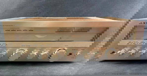 Vintage LXI 564 Stereo Receiver By Sanyo for Sears: Vintage LXI 564 Stereo Receiver By Sanyo for Sears  1980s LXI stereo receiver, model 564made by Sanyo in Japan for the Sears Roebuck company. The model has a stainless face with imitation wood sides.