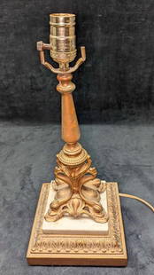 Vintage Brass Tone Light Metal Lamp: Vintage Brass Tone Light Metal Lamp. This is approx 7 1/2" x 7 1/2" x 17 3/8" and it weighs 6.57lbs. The lamp was tested and it works. There is some wear and color loss on the lamp. The bottom felt is