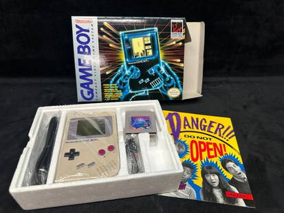 Nintendo Game Boy W/ Tetris Complete In Box: Nintendo Game Boy original model DMG-01 with Tetris game cartridge, factory box, manuals, headphones, and Game Link cable. Created by Nintendo, featuring the classic 8-bit handheld game system. Includ