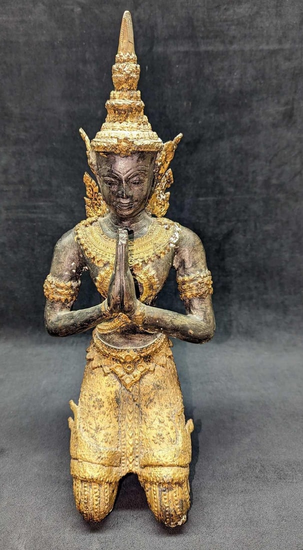 Vintage Bronze Teppanom Kneeling Buddha Figure B: Vintage Bronze Teppanom Kneeling Buddha Figure B. Its maker and date of creation are unknown. This figure is approx 8" x 7" x 17" and it weighs 12.90 lbs. The figure is in good, vintage condition with