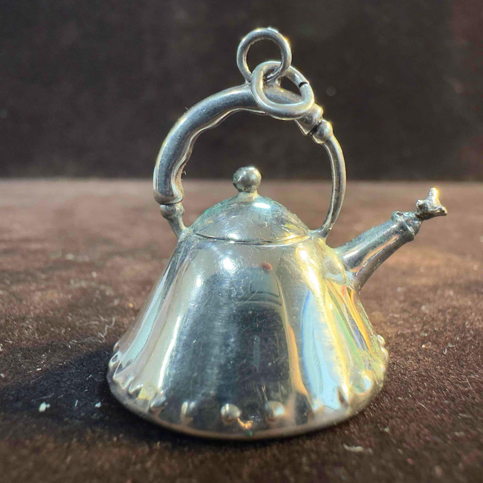 Miniature Alessi Michael Graves Design Sterling Silver Tea Kettle Charm Pendant: This item is in good pre-owned, previously used/displayed condition with noticeable light wear, and surface scratches. Please reference all photos for full details. This piece of jewelry has been test