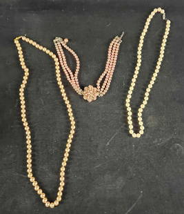 Pearl Necklace Synthetic Pearl Necklace Lot: Pearl Necklace Synthetic Pearl Necklace Lot This lot has three faux pearl necklaces that are in fair condition. One has a stand that came loose from its clasp and others have some slight wear. Overall