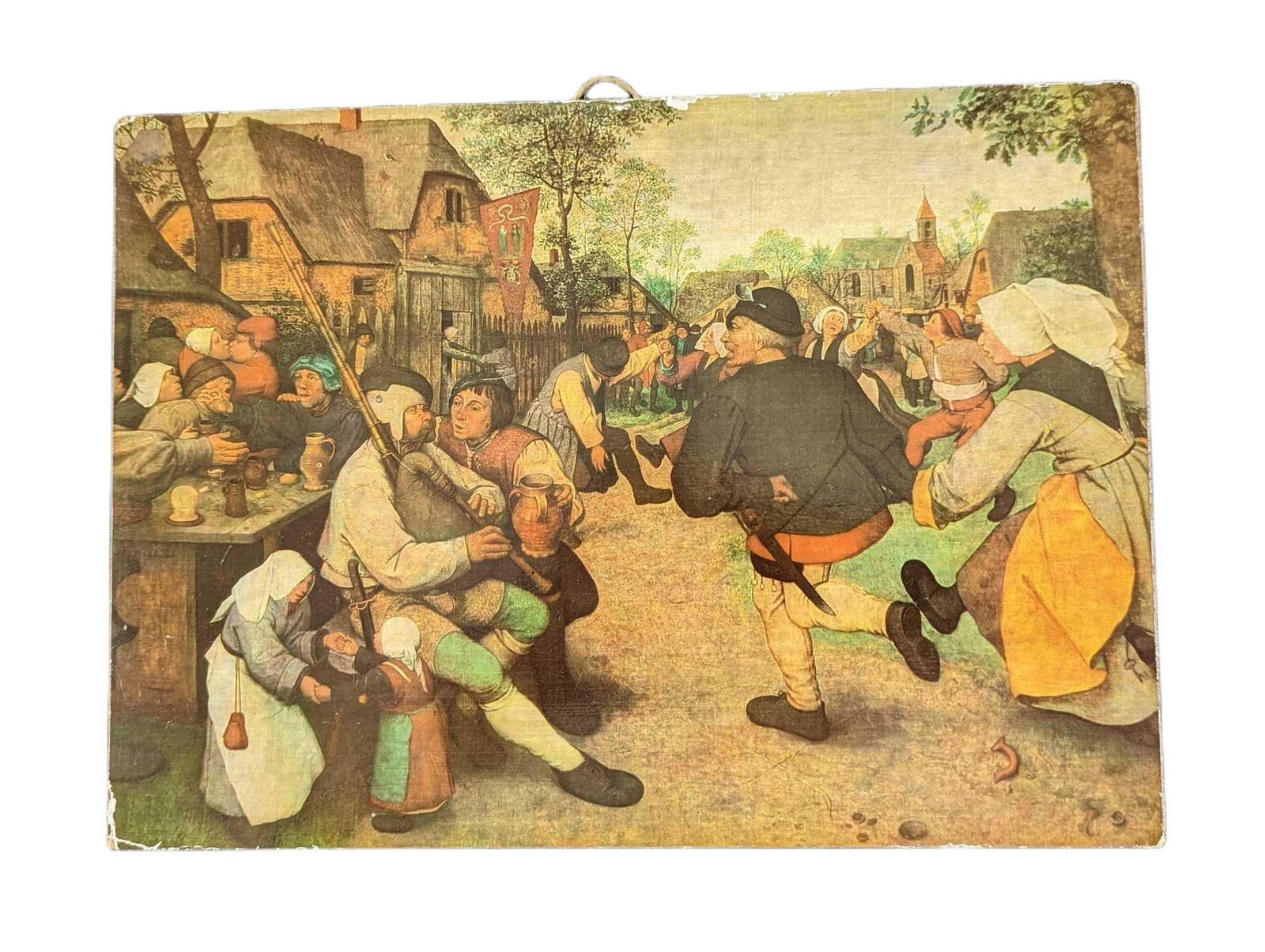 Pieter Bruegel Peasant Dance Print On Wood: Pieter Bruegel Peasant Dance Print On Wood. The print on wood is approx 11 1/2" x 3/8" x 8" and it weighs 1.06lb. The print on wood is in a good, vintage condition with wear and chips on the corners a