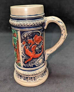 Old Gerz German Tavern Scene Ceramic Stein: Old Gerz German Tavern Scene Ceramic Stein. Made in West Germany. This is approx 6 1/2" x 4 1/2" x 9" and it weighs 3.23lbs. The stein has some color loss. Please see the images as they are part of th