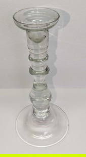 Vintage Clear Glass 10" Candlestick Holder B: Vintage Clear Glass 10" Candlestick Holder B. The maker and date of creation are unknown. This is approx 4 5/8" x 4 5/8" x 10" and it weighs 1.27lb.