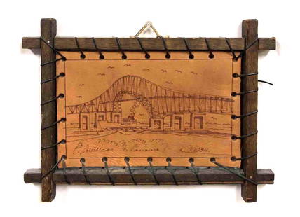 Signed Leather Engraving With Wood Frame: This lot contains a Signed Leather Engraving With Wood Frame. The frame is approx 8 1/2" x 11 1/2" while the leather engraving is approx 5 1/2" x 8 1/2" and it weighs about 0.3lbs. Overall the Le