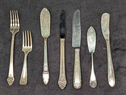 Stainless Steel & Silver Plated Butter Knives & Flatware: Stainless Steel &amp; Silver Plated Butter Knives &amp; Flatware. This lot contains:  (1) Unmarked Stainless Steel Knife. This is approx 3/4&#34; x 1/4&#34; x 7&#34;. (1) Unmarked Silver Plate Butter